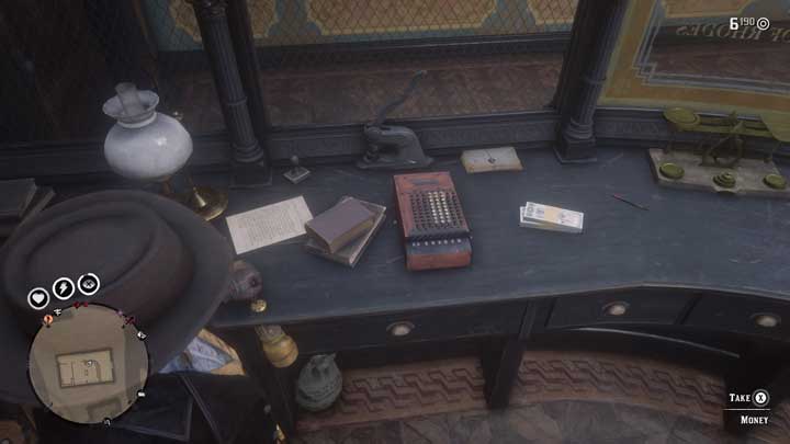 Money clip inside Rhodes bank in RDR2 Online